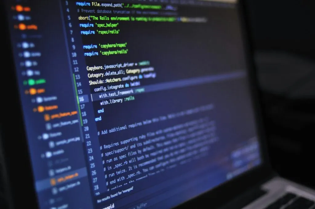 Best Computer Training Institute in Trichy | DOT Institute Trichy Close-up of a computer screen displaying programming code in a dark environment.